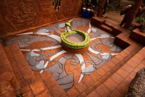 Even the floor is decorated with sculpted elephant patterns